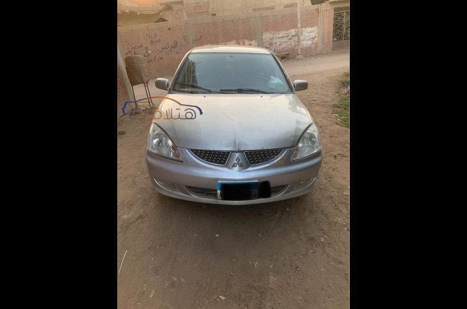 Lancer Puma Mitsubishi فضي