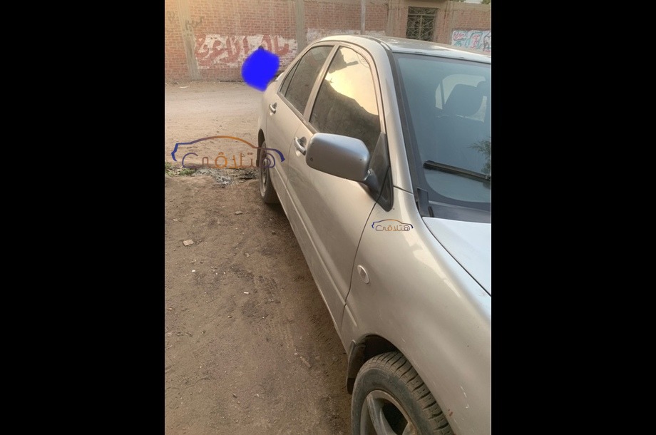 Lancer Puma Mitsubishi فضي