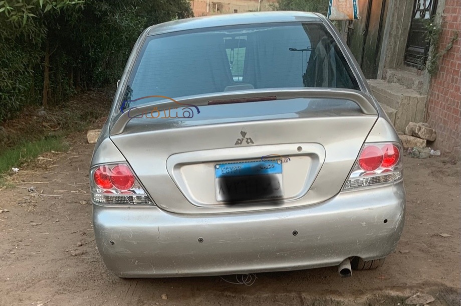 Lancer Puma Mitsubishi فضي