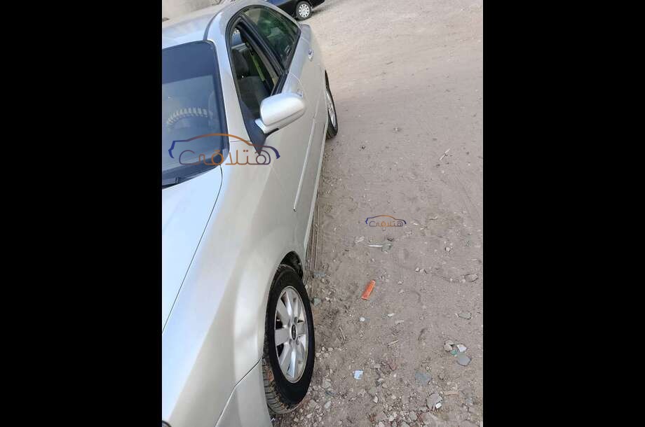 Optra Chevrolet فضي