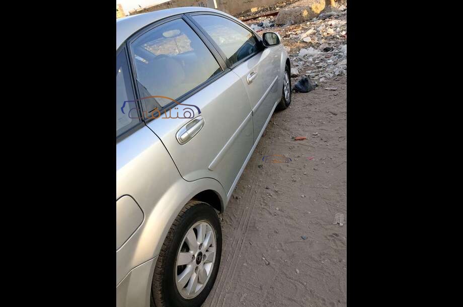 Optra Chevrolet فضي