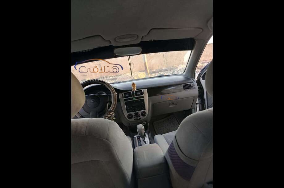 Optra Chevrolet فضي