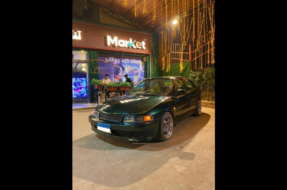 Lancer Crystala Mitsubishi أخضر