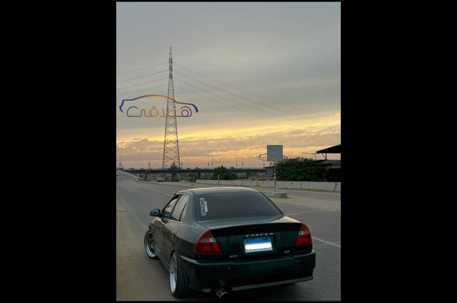 Lancer Crystala Mitsubishi أخضر