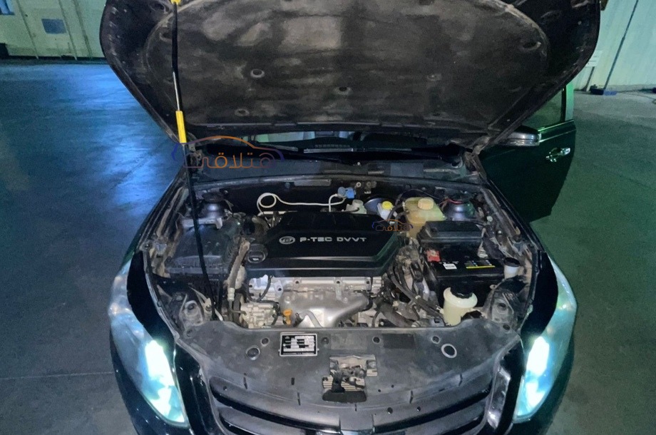 Optra Chevrolet رمادي