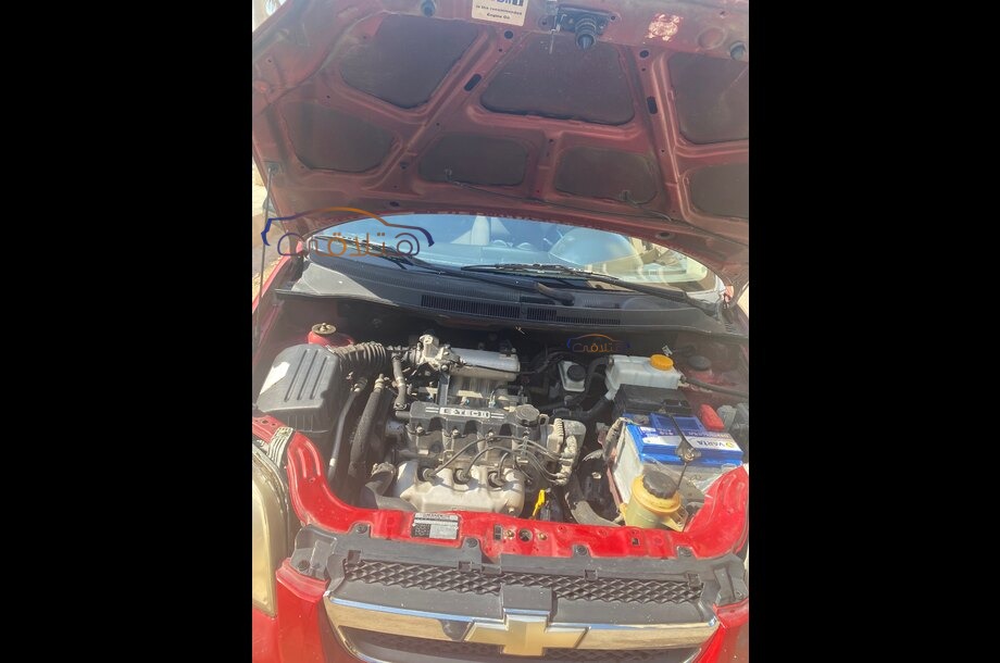Aveo Chevrolet احمر غامق