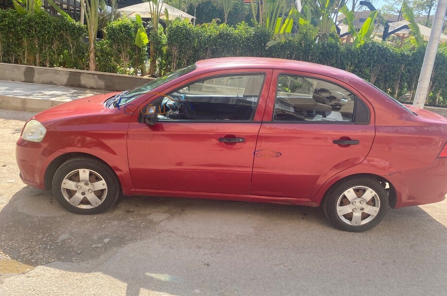 Aveo Chevrolet احمر غامق
