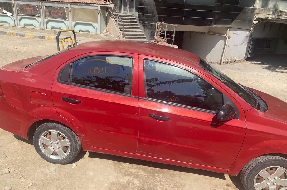 Aveo Chevrolet احمر غامق