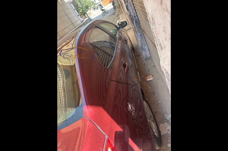 Optra Chevrolet احمر