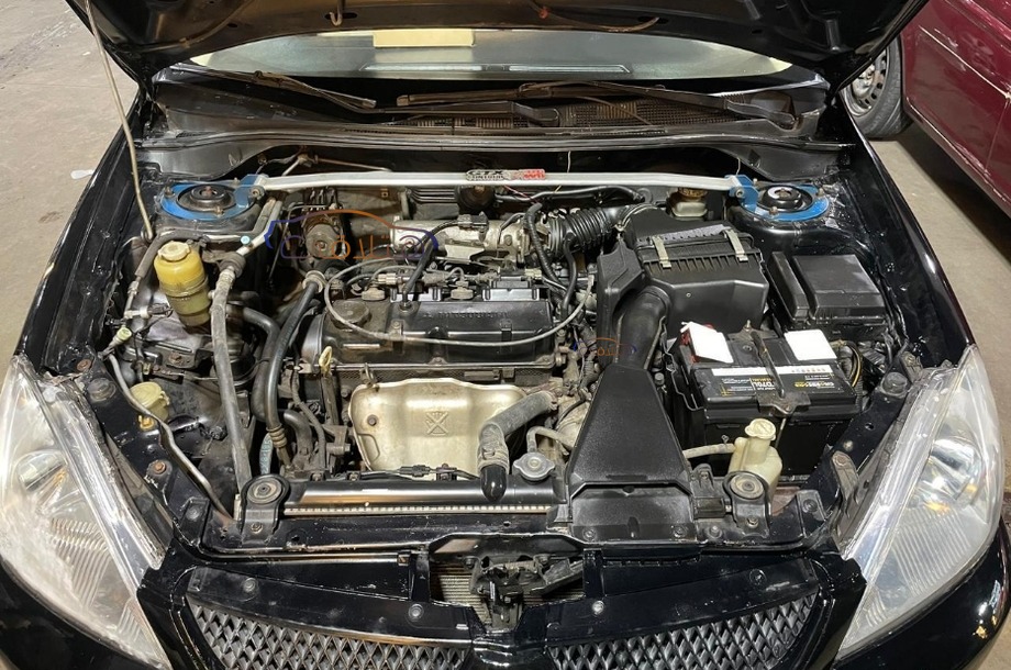 Lancer Puma Mitsubishi أسود