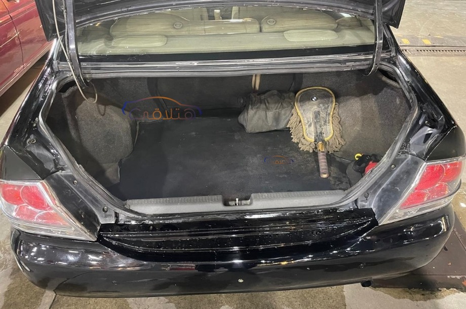 Lancer Puma Mitsubishi أسود