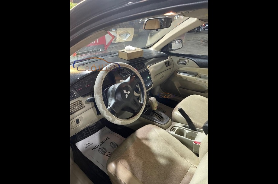 Lancer Puma Mitsubishi أسود