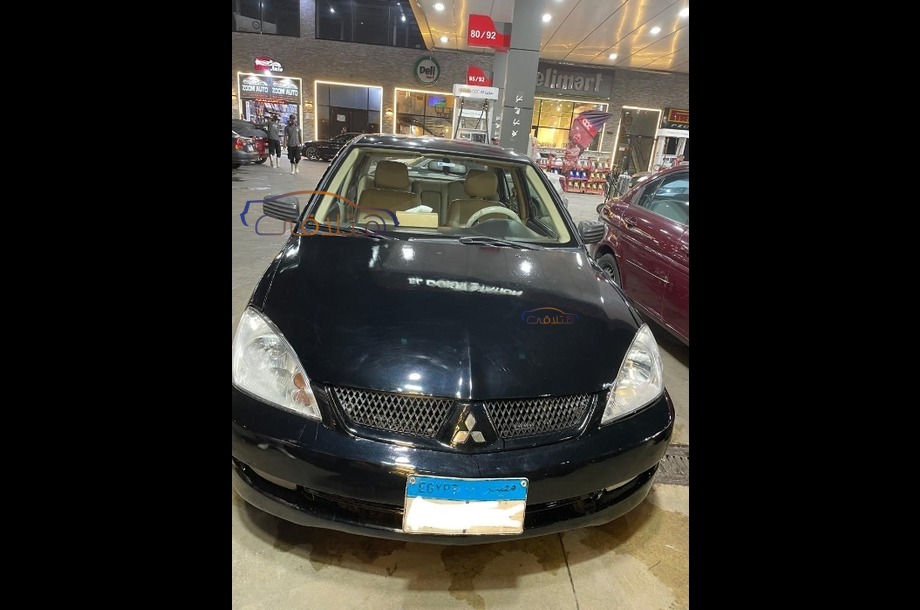 Lancer Puma Mitsubishi أسود