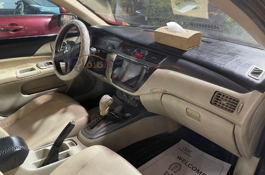 Lancer Puma Mitsubishi أسود