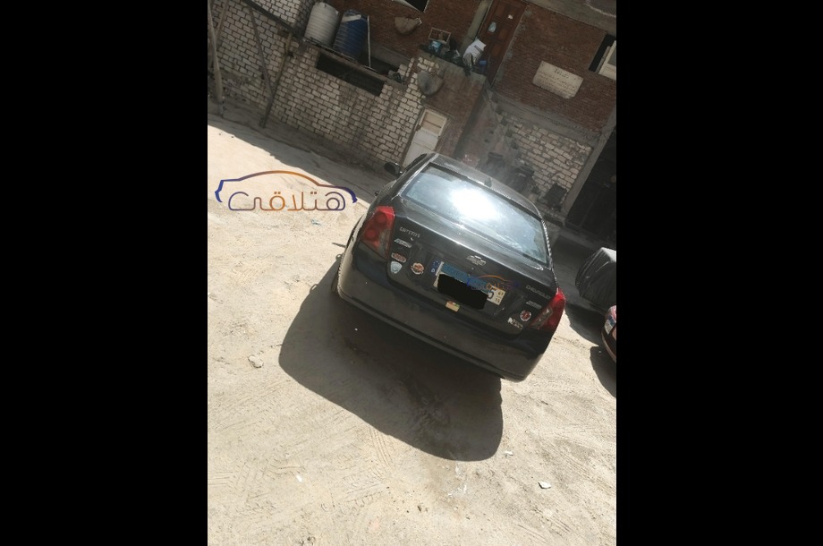 Optra Chevrolet أسود