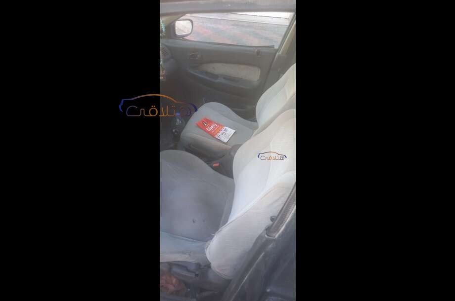 323 Mazda الأزرق الداكن