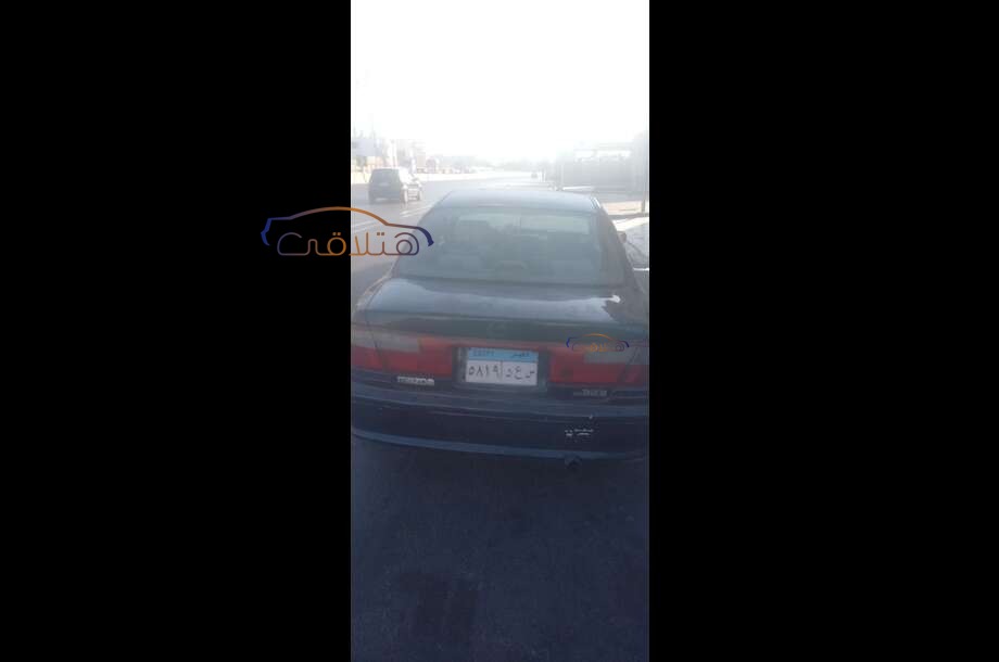 323 Mazda الأزرق الداكن