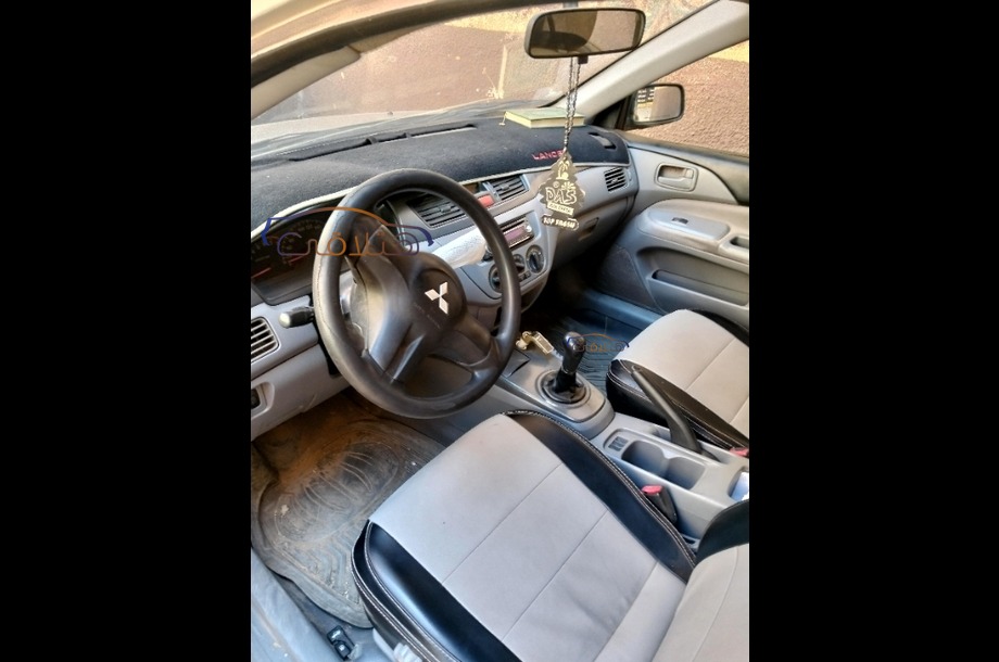 Lancer Puma Mitsubishi فضي