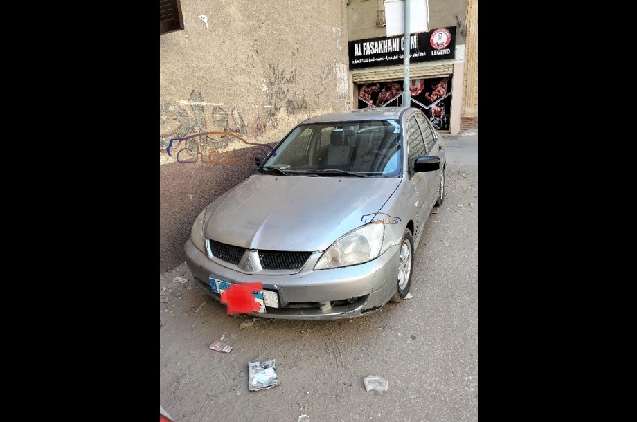 Lancer Puma Mitsubishi فضي