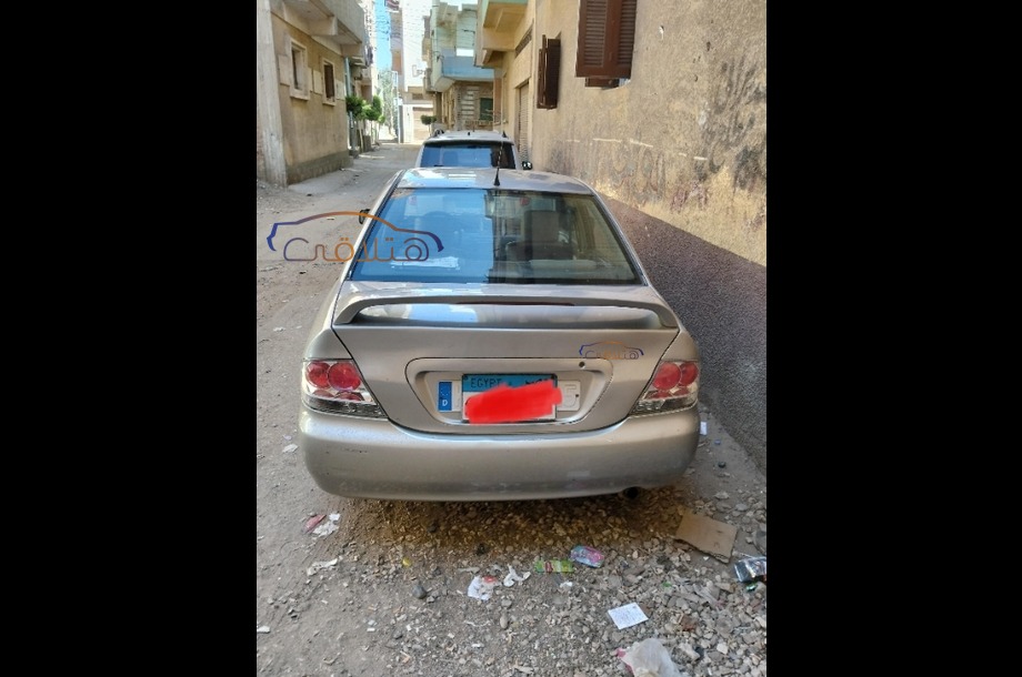 Lancer Puma Mitsubishi فضي