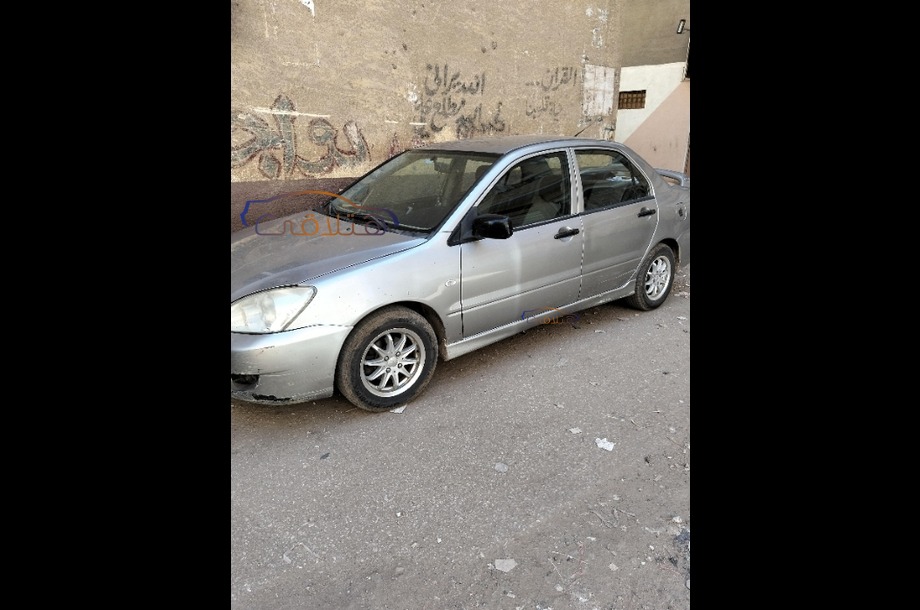 Lancer Puma Mitsubishi فضي