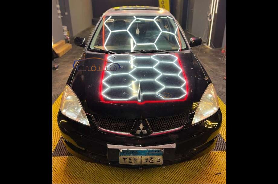 Lancer Puma Mitsubishi أسود