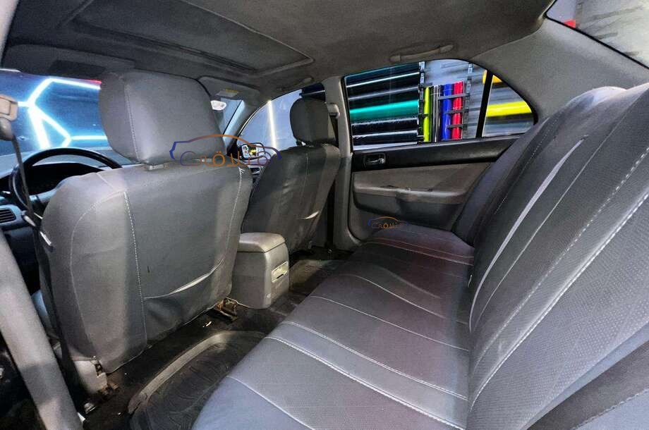 Lancer Puma Mitsubishi أسود