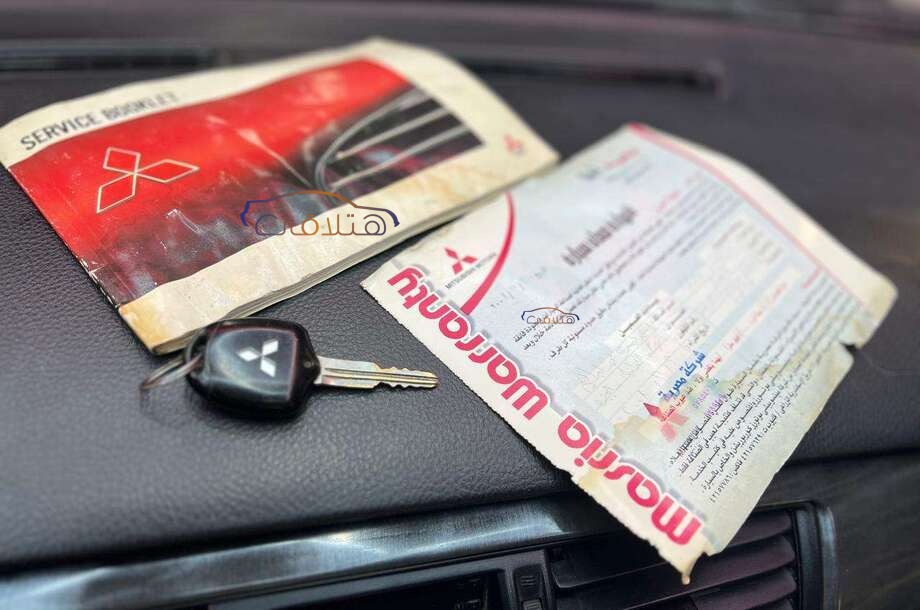 Lancer Puma Mitsubishi أسود