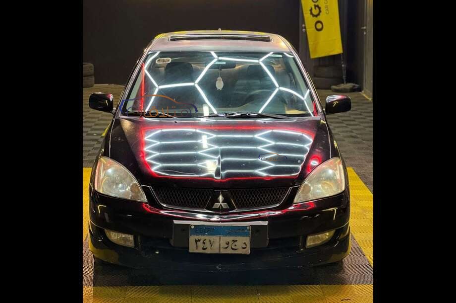 Lancer Puma Mitsubishi أسود