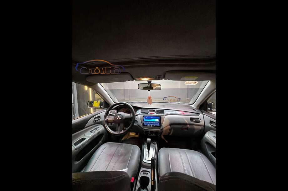 Lancer Puma Mitsubishi أسود