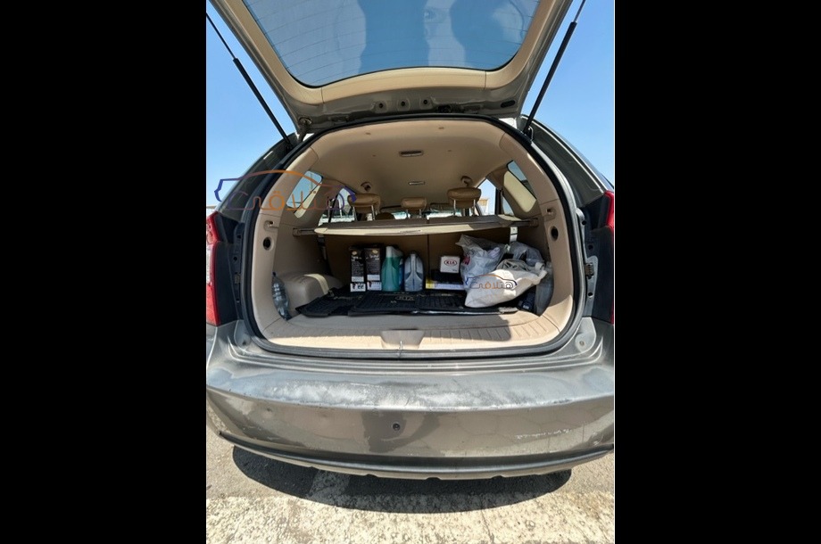 Carens Kia برونزي