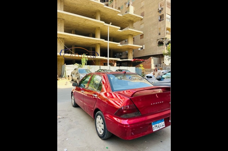 Lancer Mitsubishi احمر