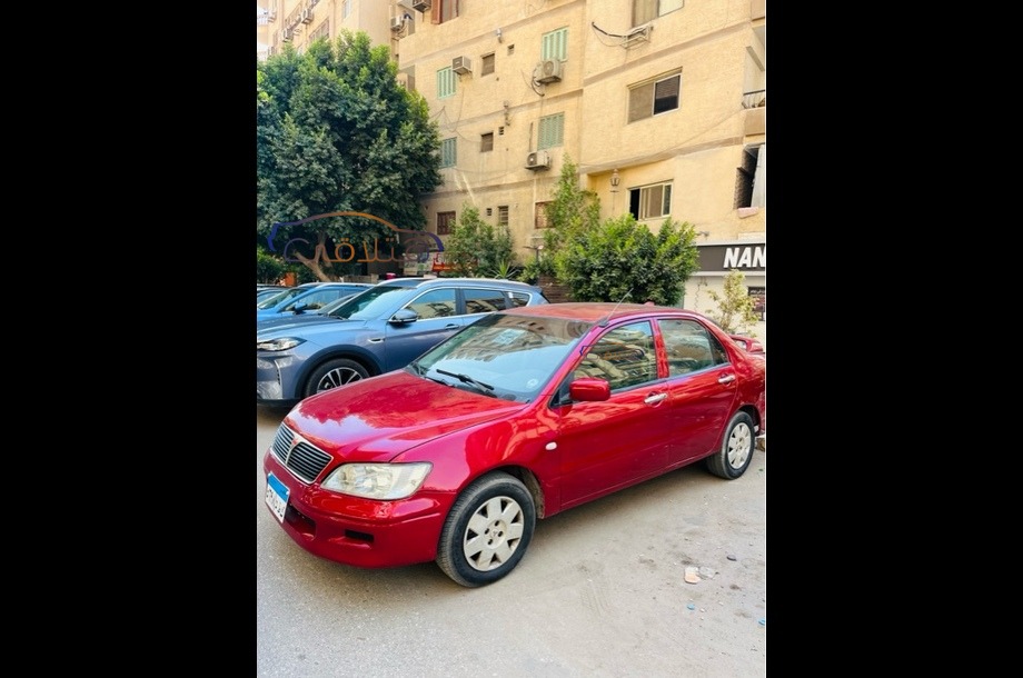 Lancer Mitsubishi احمر