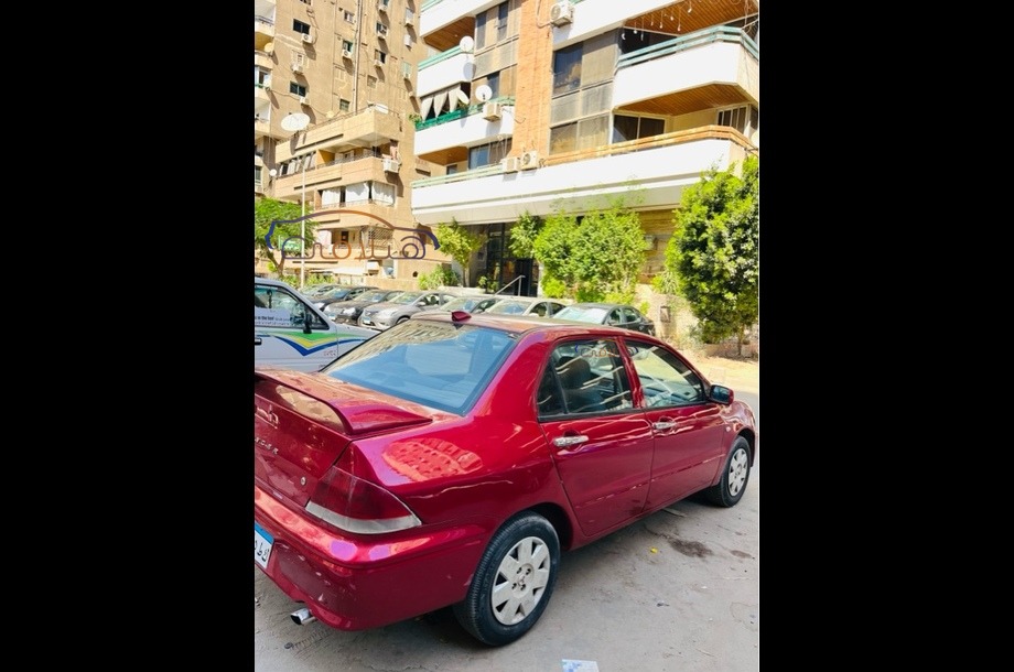 Lancer Mitsubishi احمر