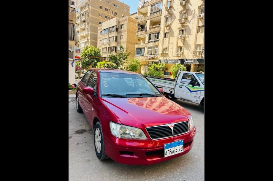 Lancer Mitsubishi احمر