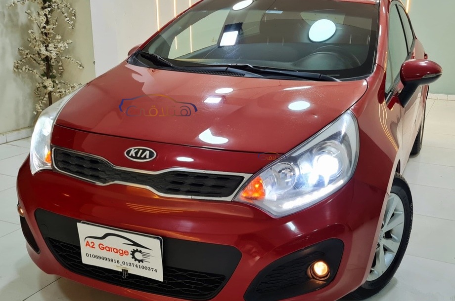 Rio Kia احمر غامق