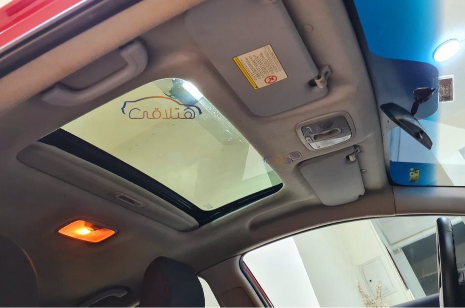 Rio Kia احمر غامق