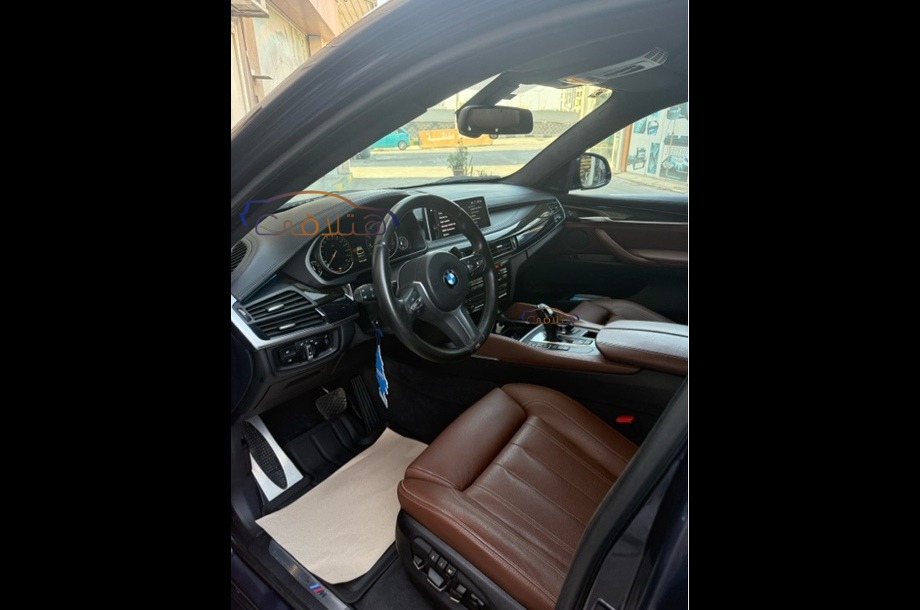 X6 M BMW الأزرق الداكن