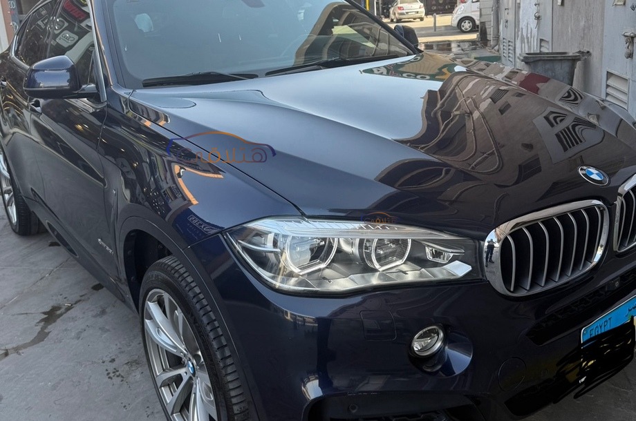 X6 M BMW الأزرق الداكن