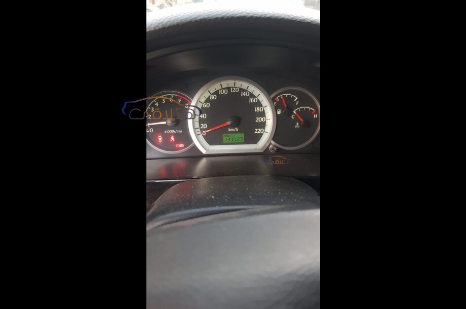 Optra Chevrolet احمر غامق