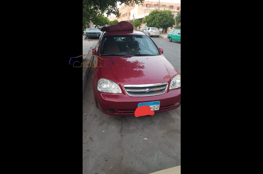 Optra Chevrolet احمر غامق