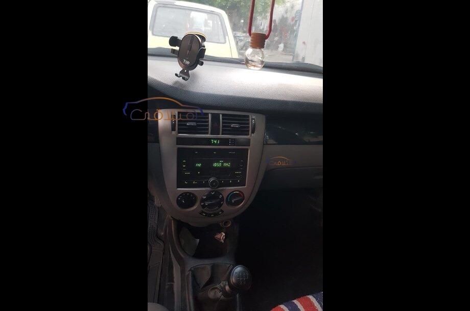 Optra Chevrolet احمر غامق