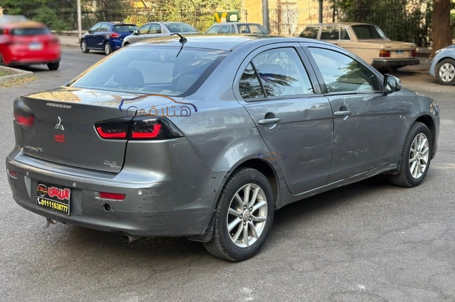 Lancer EX Shark Mitsubishi فضي