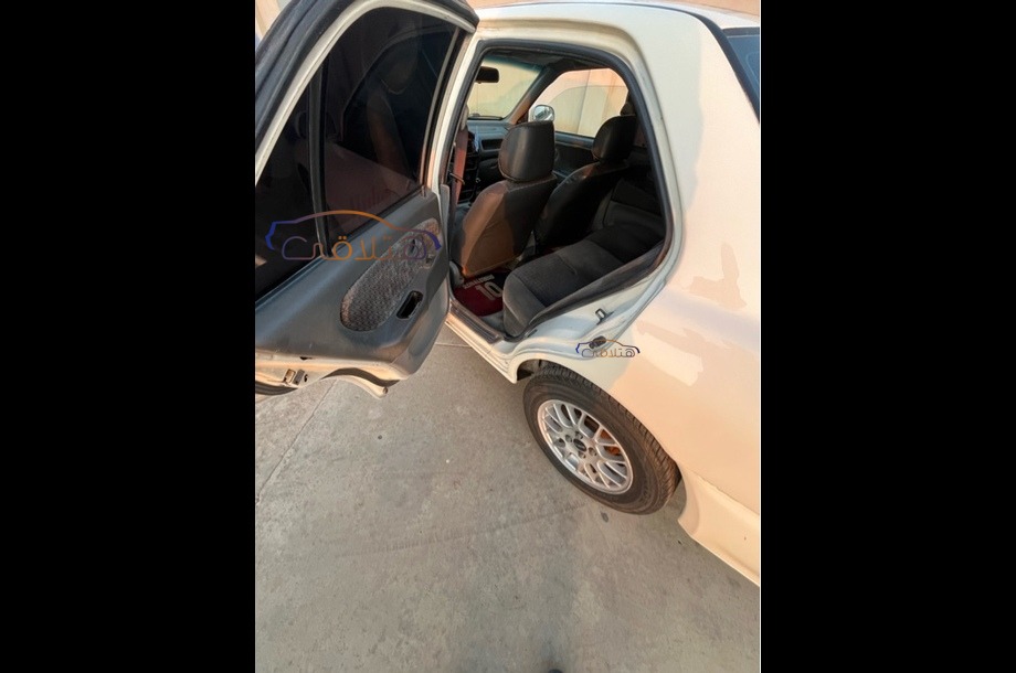 Wira Proton أبيض