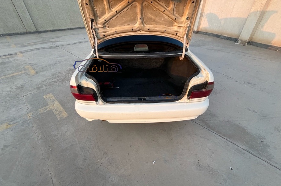 Wira Proton أبيض