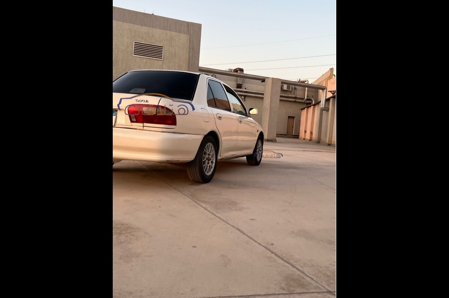 Wira Proton أبيض