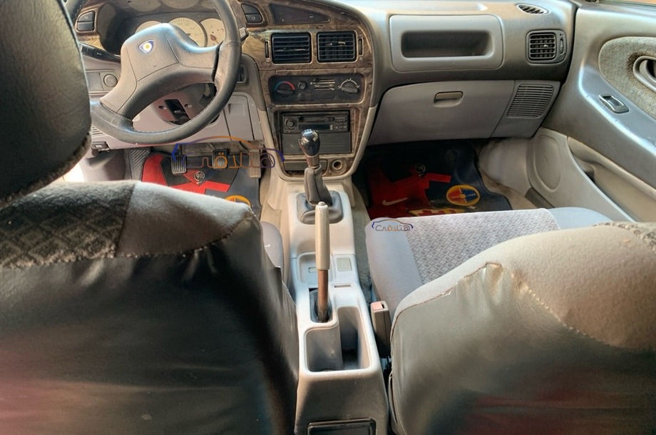 Wira Proton أبيض