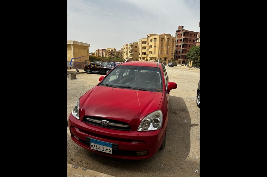 Carens Kia احمر