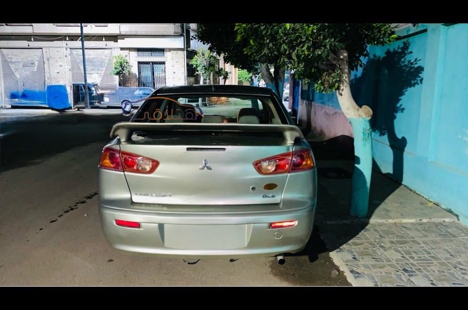 Lancer EX Shark Mitsubishi ذهبي
