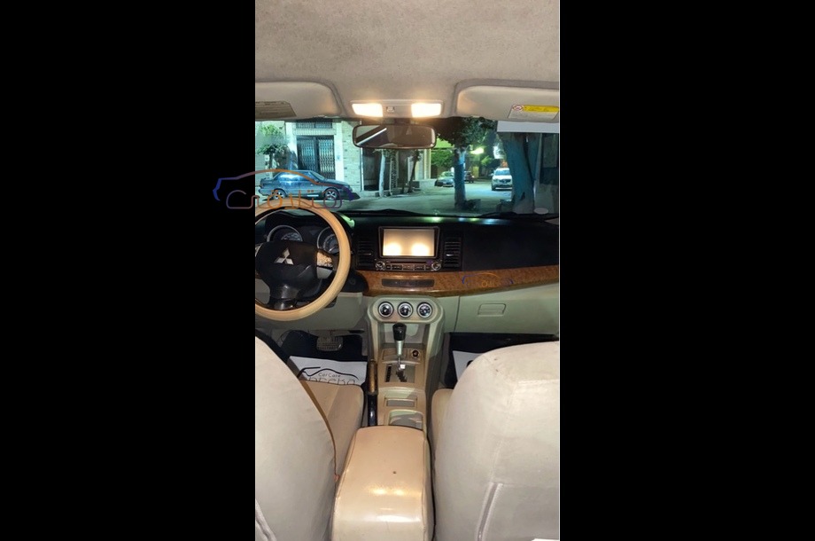Lancer EX Shark Mitsubishi ذهبي